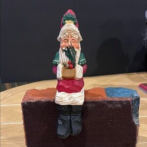 Charming Holiday Santa Figurine with Green and Red Details